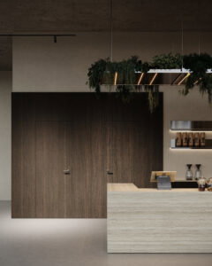 Render van een horecagelegenheid met bar uitgewerkt in plaatmateriaal FD01 Taranta van Cleaf, welke de beleving van travertin heeft. De wandafwerking uitgewerkt in een zandkleurig decor FD10 Taranta van Cleaf en donkerbruine tint van LN55 Maloja, een decor dat is geïnspireerd op mat gelakt notenhout.