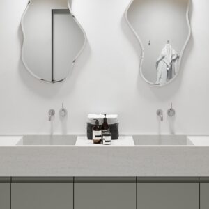 Render van een badkamer, ontworpen in het solid surface decor DM5017 Grigio waarmee je de look van glas-, graniet- of zandsteen korrels beleefd