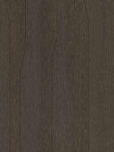 Detailafbeelding van decoratief plaatmateriaal met een dynamisch lijnenspel in een donkerbruin eikenhout decor, de S218 Doga van Cleaf.