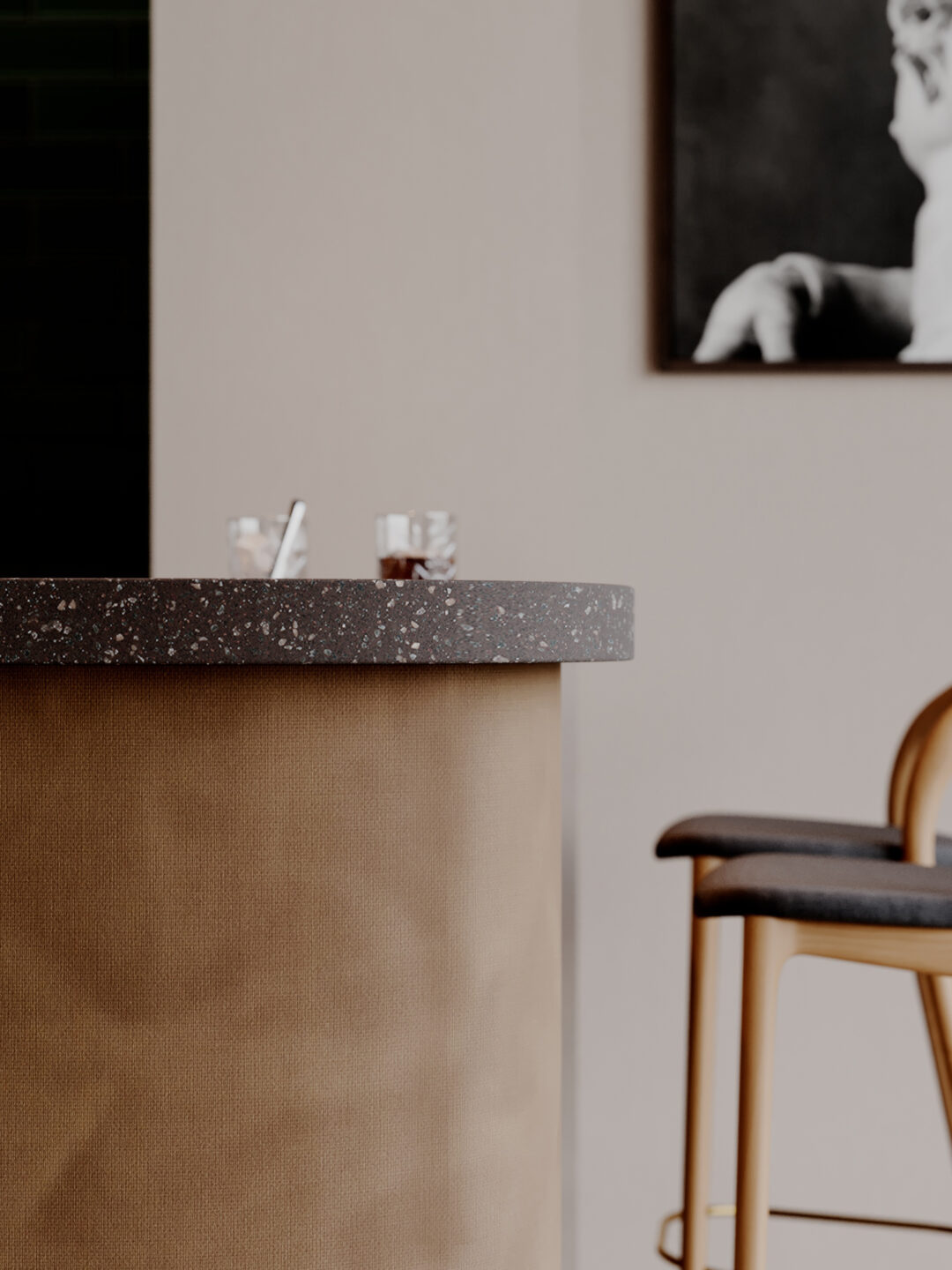 Render van een detailafbeelding van een bar, uitgewerkt in de donkerbruine FD63 Alpaca, in combinatie met een werkblad in het gespikkelde, chocoladebruine solid surface DM3041 rockaway